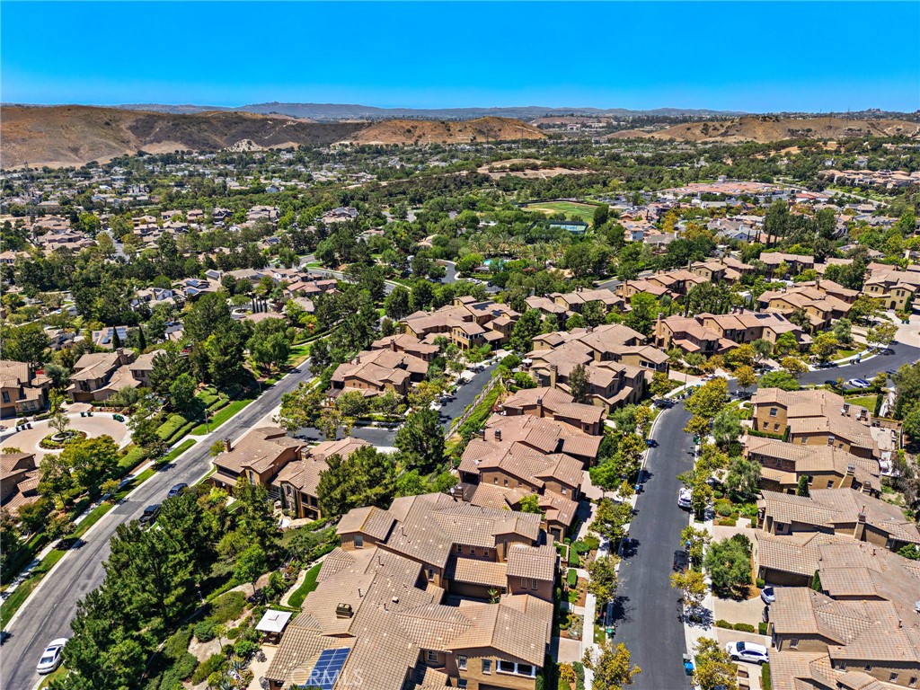 37 Tuscany Ladera Ranch, CA 92694 - Photo 46 of 53 an aerial view of residential building with green space