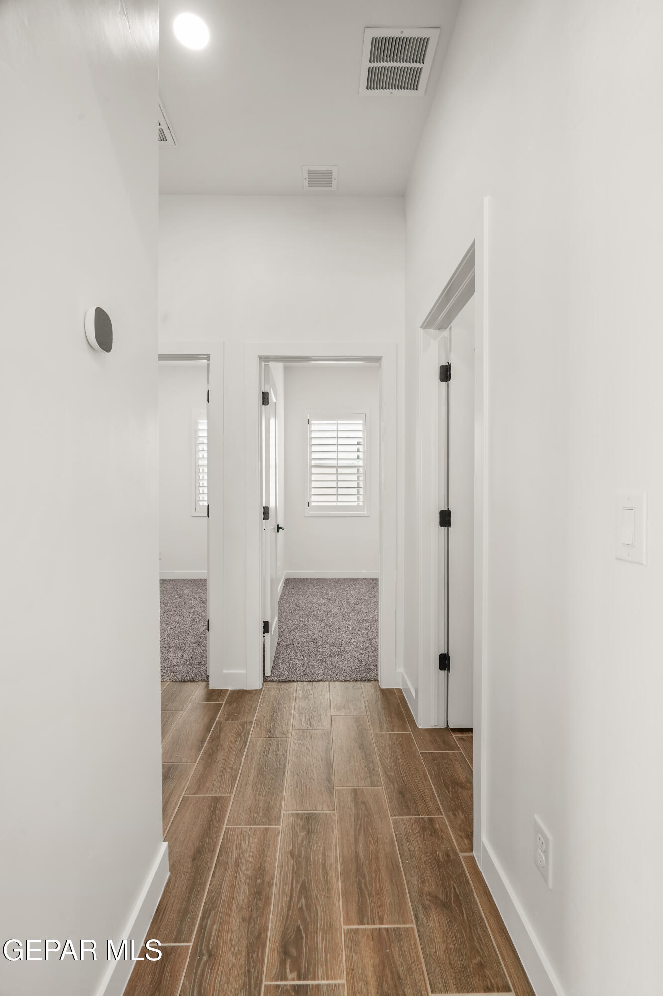 15212 Resolve Drive El Paso, TX 79938 - Photo 24 of 35 a view of empty room with wooden floor and window