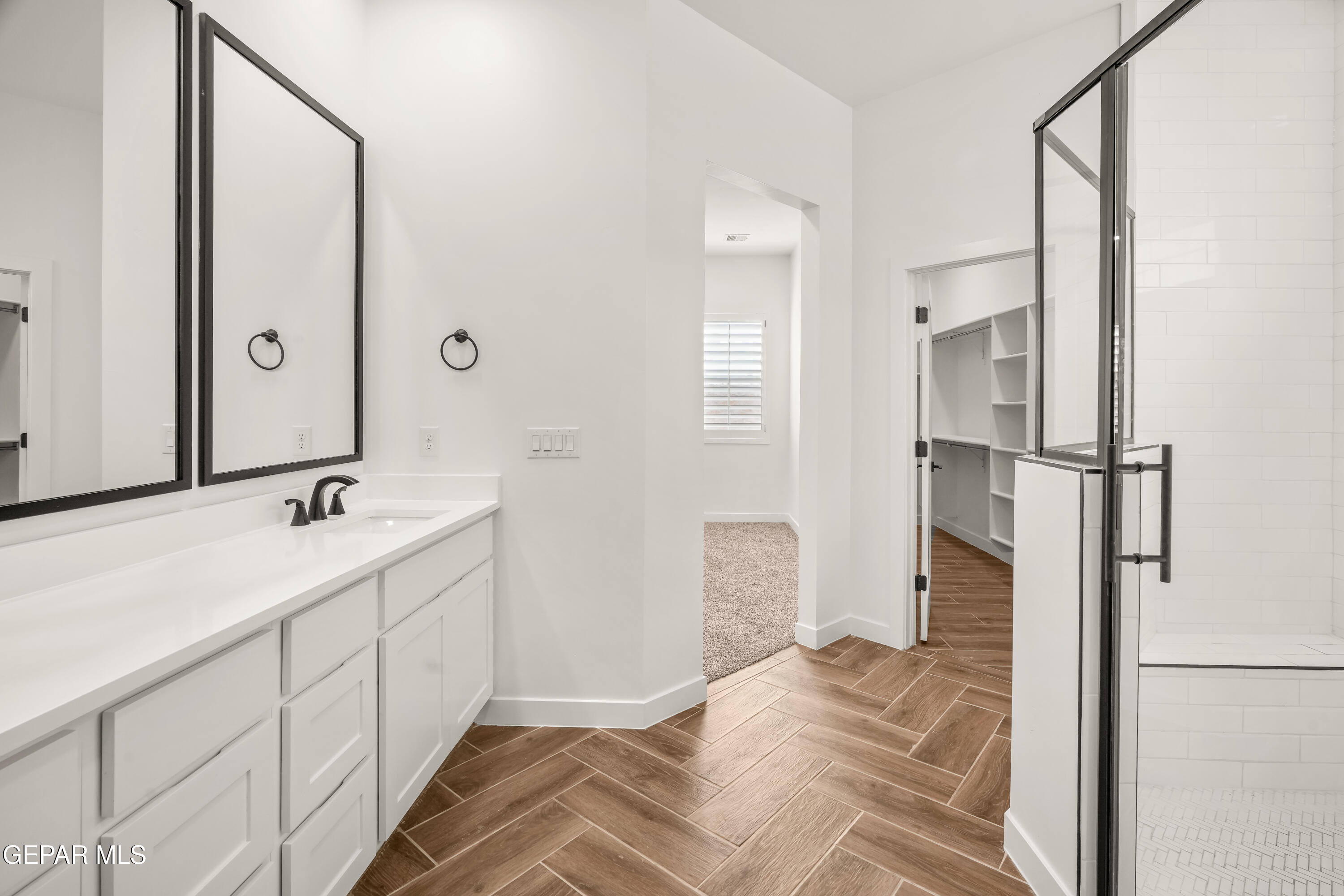 15212 Resolve Drive El Paso, TX 79938 - Photo 30 of 35 a bathroom with a tub sink and mirror