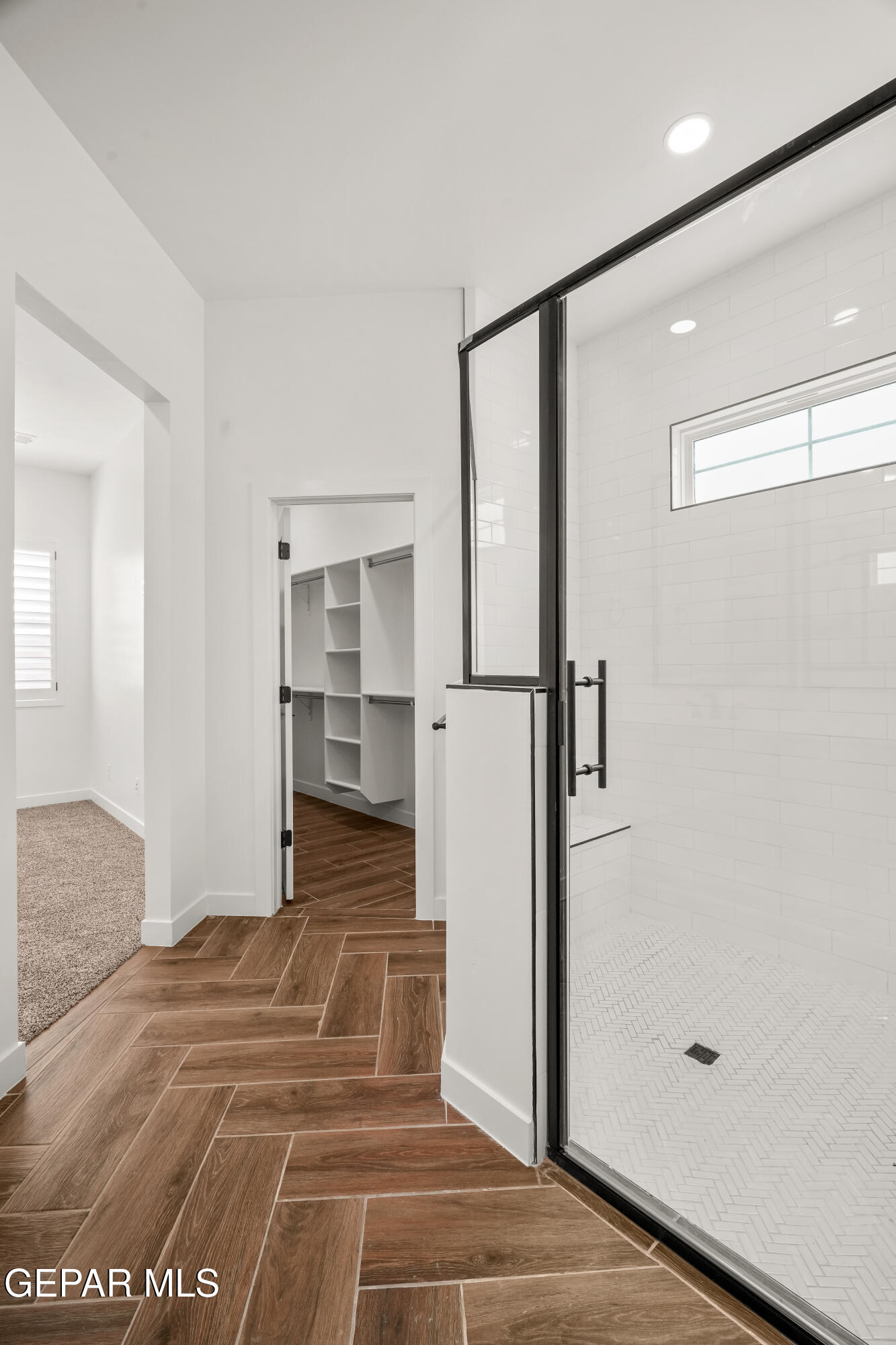 15212 Resolve Drive El Paso, TX 79938 - Photo 31 of 35 a view of a livingroom with wooden floor and a bathroom