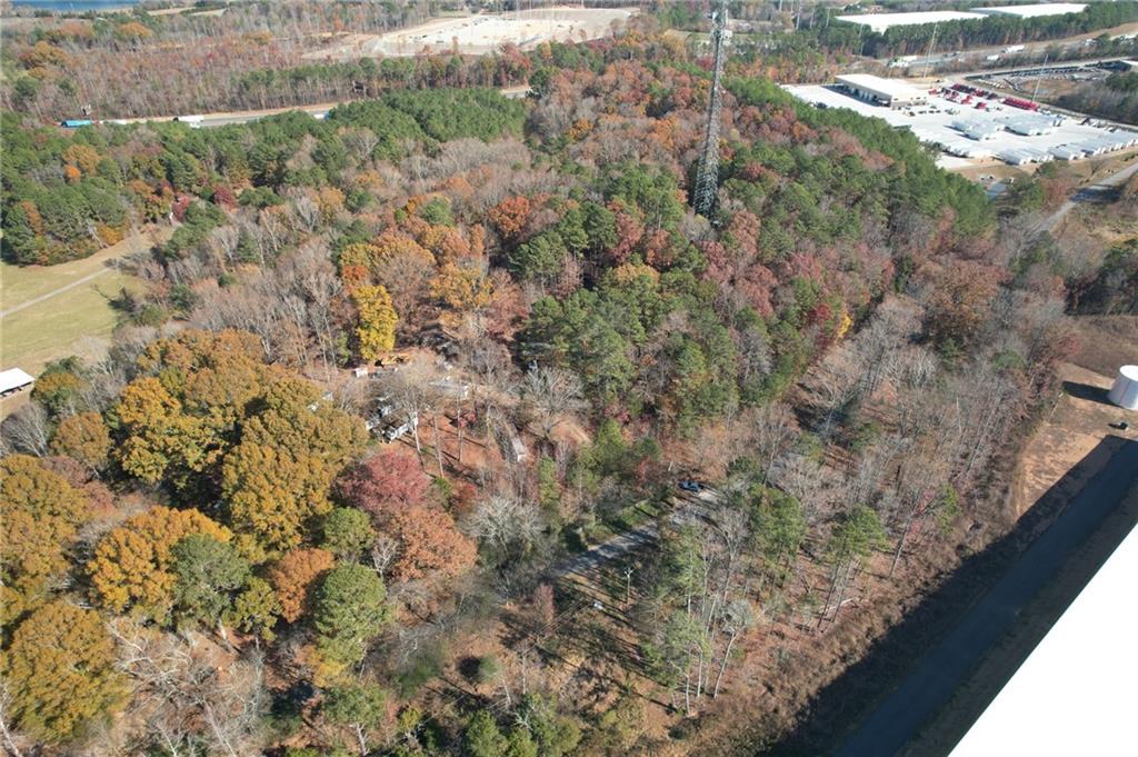 76 Brown Loop Road Cartersville, GA 30120 - Photo 1 of 9 a view of a forest that has a tree