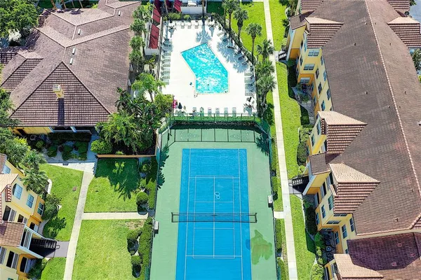 an aerial view of a house with a garden