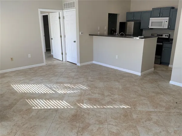 a view of a kitchen with a sink