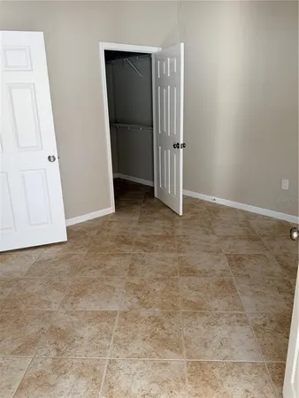 an empty room with closet