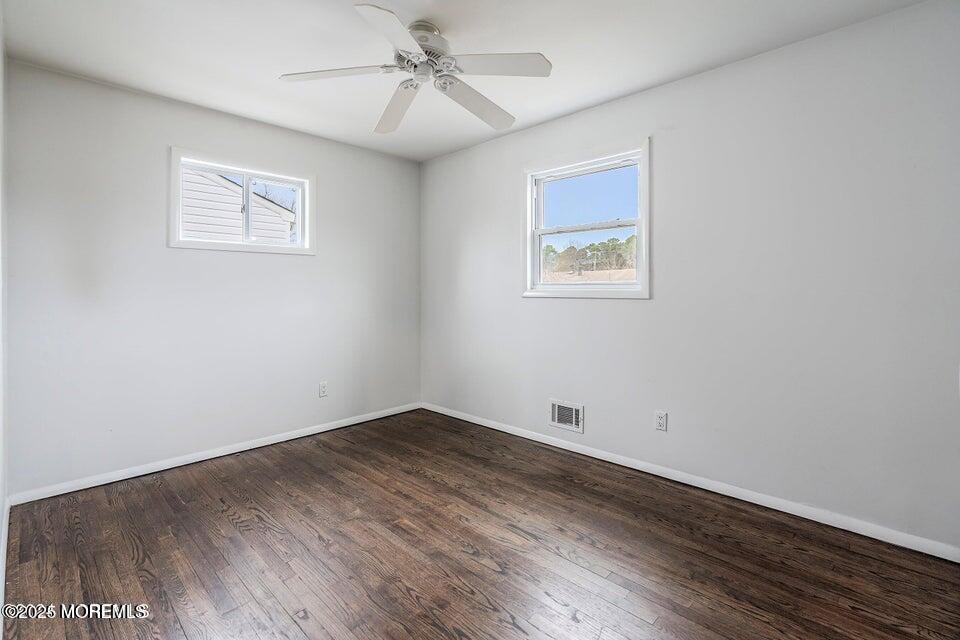 321 Lockheed Road Brick, NJ 08723 - Photo 13 of 16 a view of empty room with wooden floor