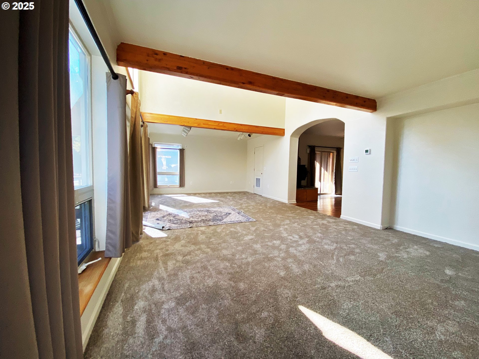 379 Mill Street Sumpter, OR 97877 - Photo 8 of 17 a view of a big room with wooden floor and balcony