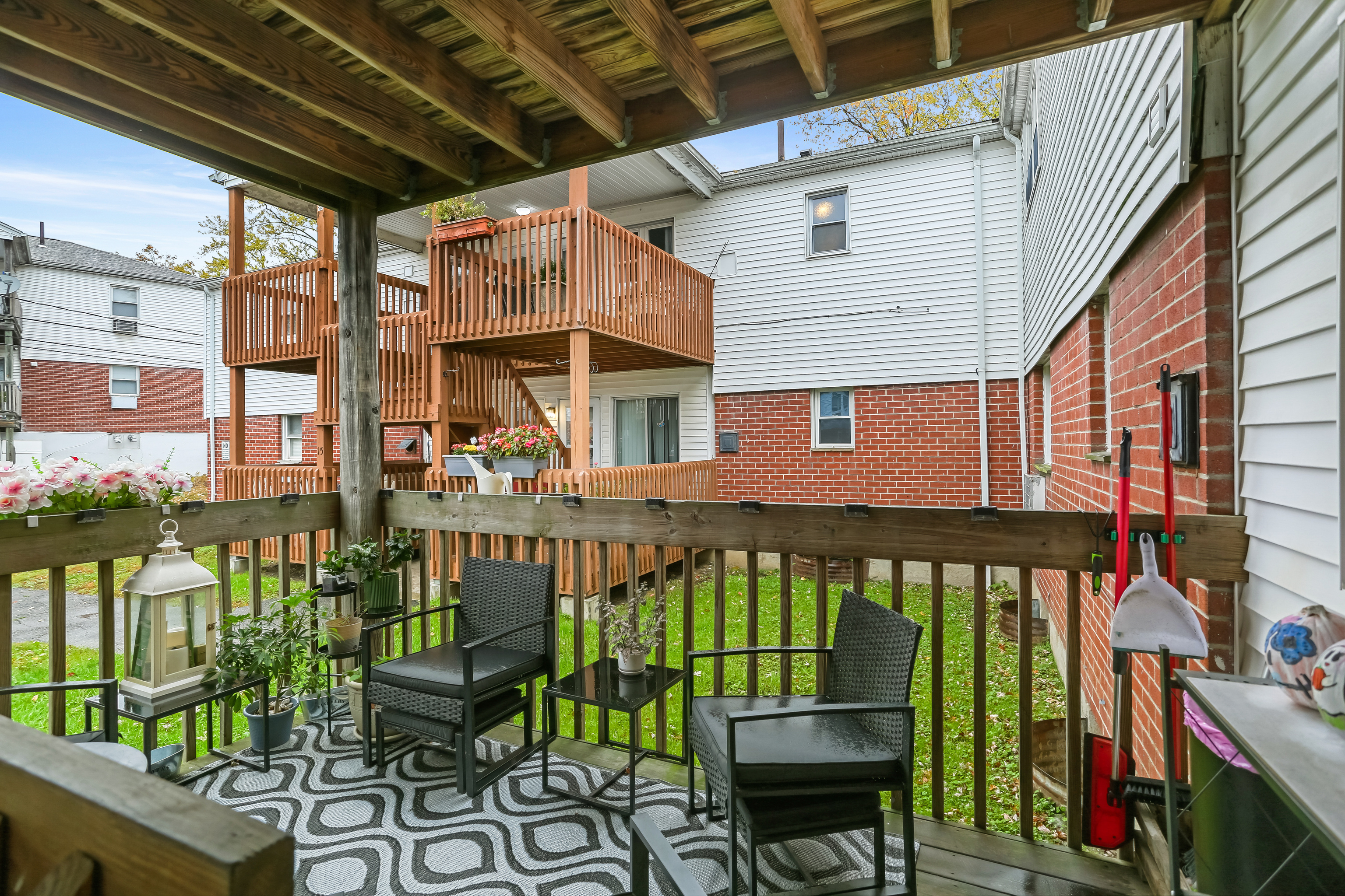 2800 Madison Avenue, Unit 1B Bridgeport, CT 06606 - Photo 2 of 10 a front view of a house with a garden