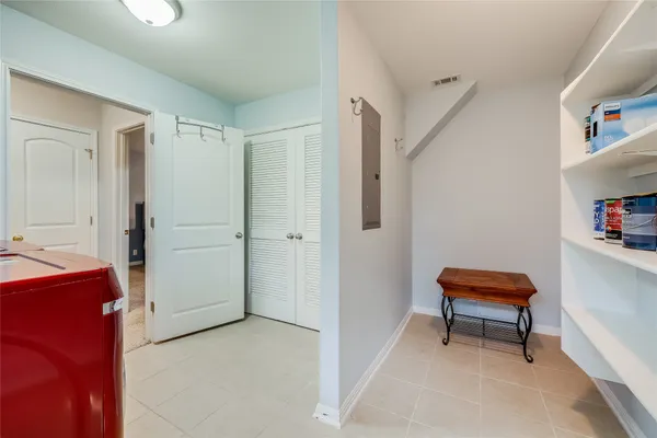 a view of room with furniture and closet