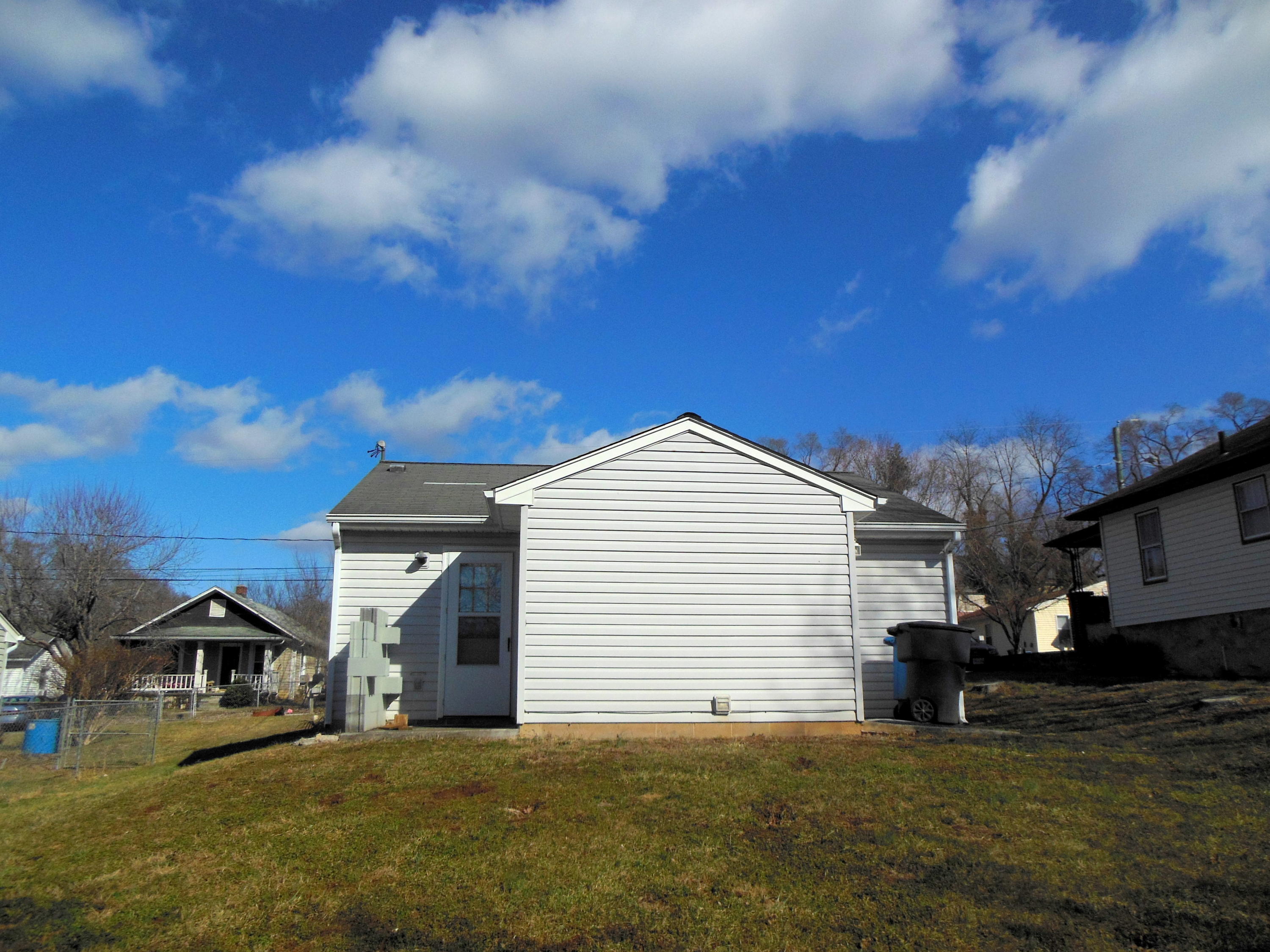 1525 Riverside Terrace Southeast Roanoke, VA 24014 - Photo 4 of 32 a view of a house with a patio