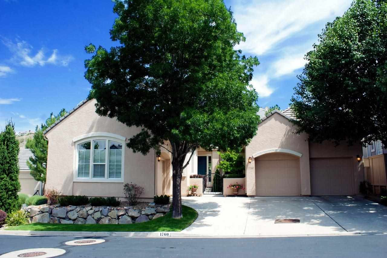 1760 Caughlin Creek Road Reno, NV 89519 - Photo 1 of 1 a front view of a house with a garden