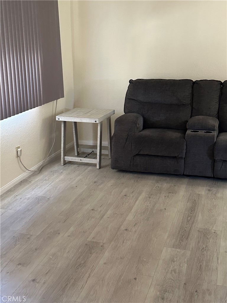 37923 Amethyst Street Palmdale, CA 93552 - Photo 11 of 34 a living room with furniture and a couch