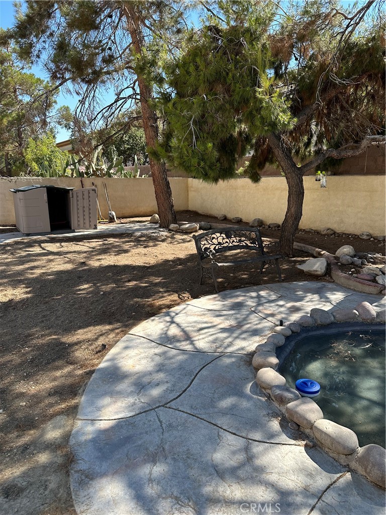 37923 Amethyst Street Palmdale, CA 93552 - Photo 17 of 34 a view of a yard with large trees