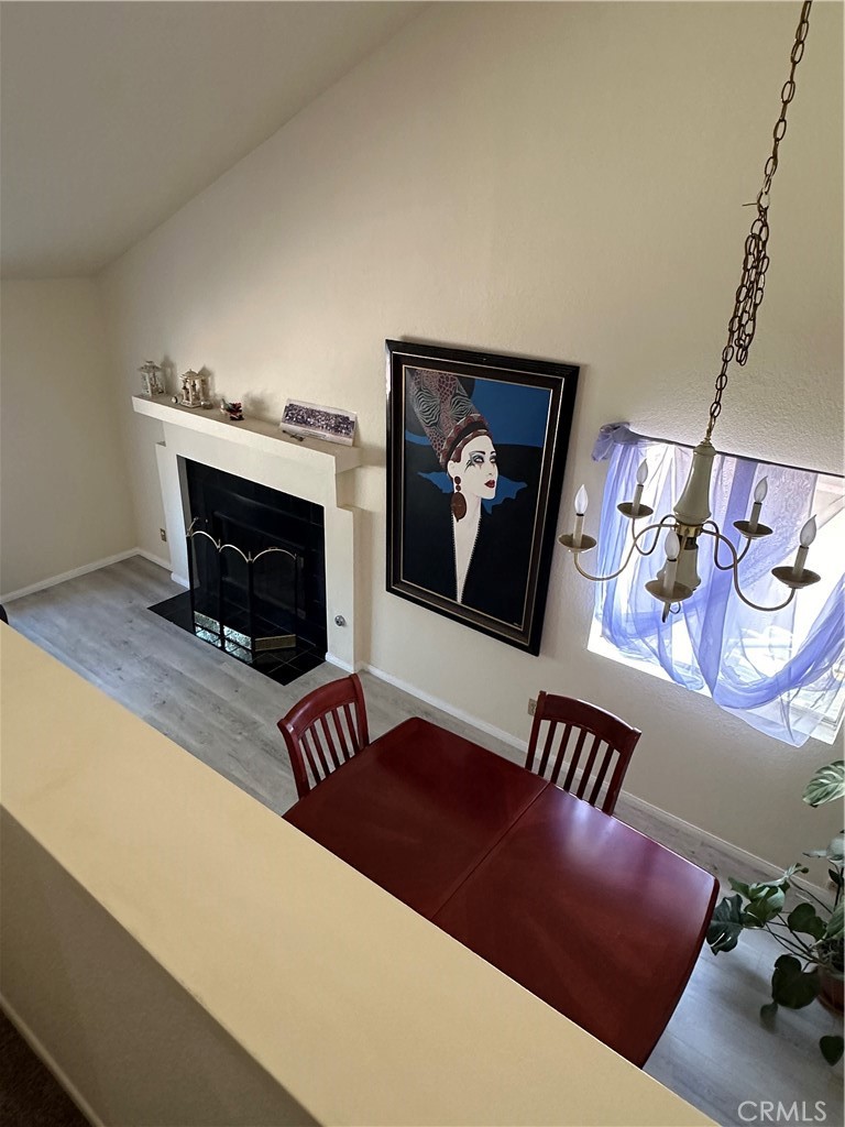 37923 Amethyst Street Palmdale, CA 93552 - Photo 25 of 34 a living room with furniture and a fireplace
