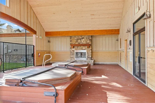 a view of a balcony with table and chairs