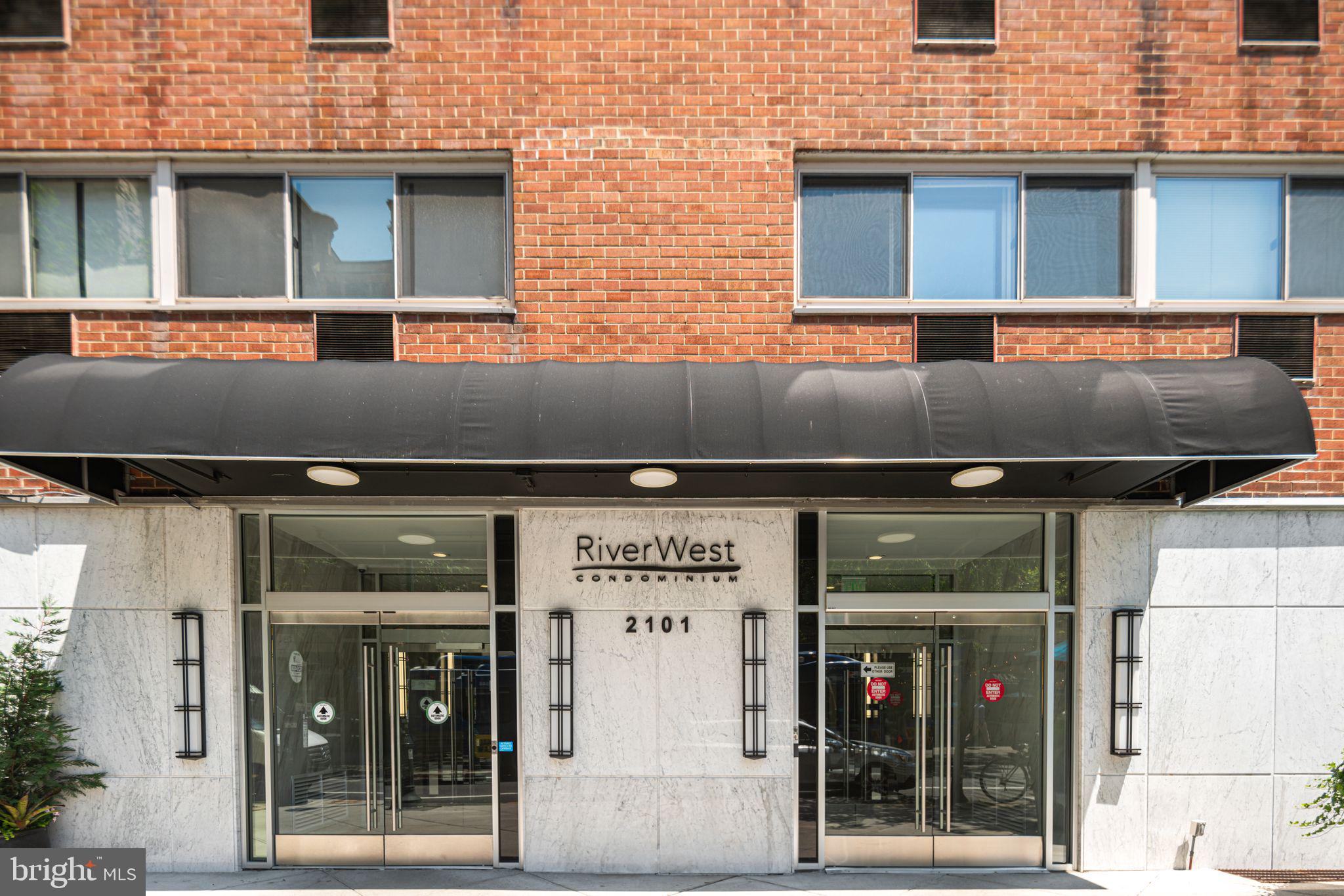 2101 Chestnut Street, Unit 518 Philadelphia, PA 19103 - Photo 14 of 14 a view of a building with a door and a refrigerator