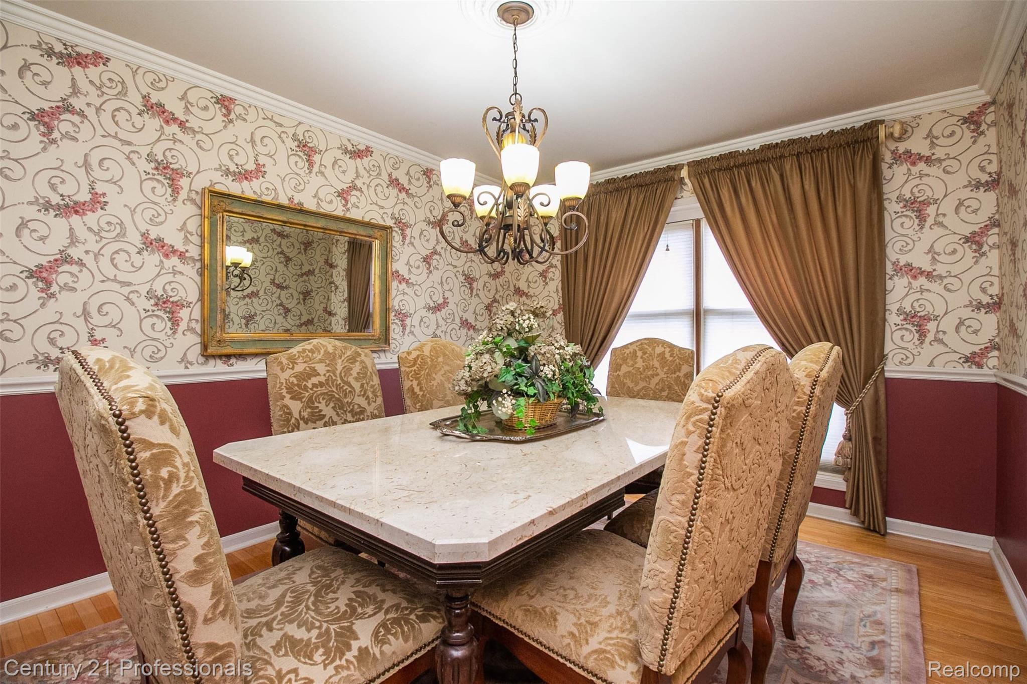 69401 Eldred Road Romeo, MI 48065 - Photo 23 of 65 crisp white crown & chair railing T/O Dining Rm