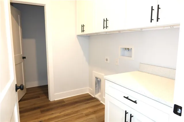 a kitchen with a sink and a stove