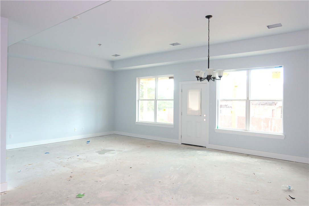 2012 Reagan Court Bryan, TX 77802 - Photo 7 of 19 a view of an empty room with a window