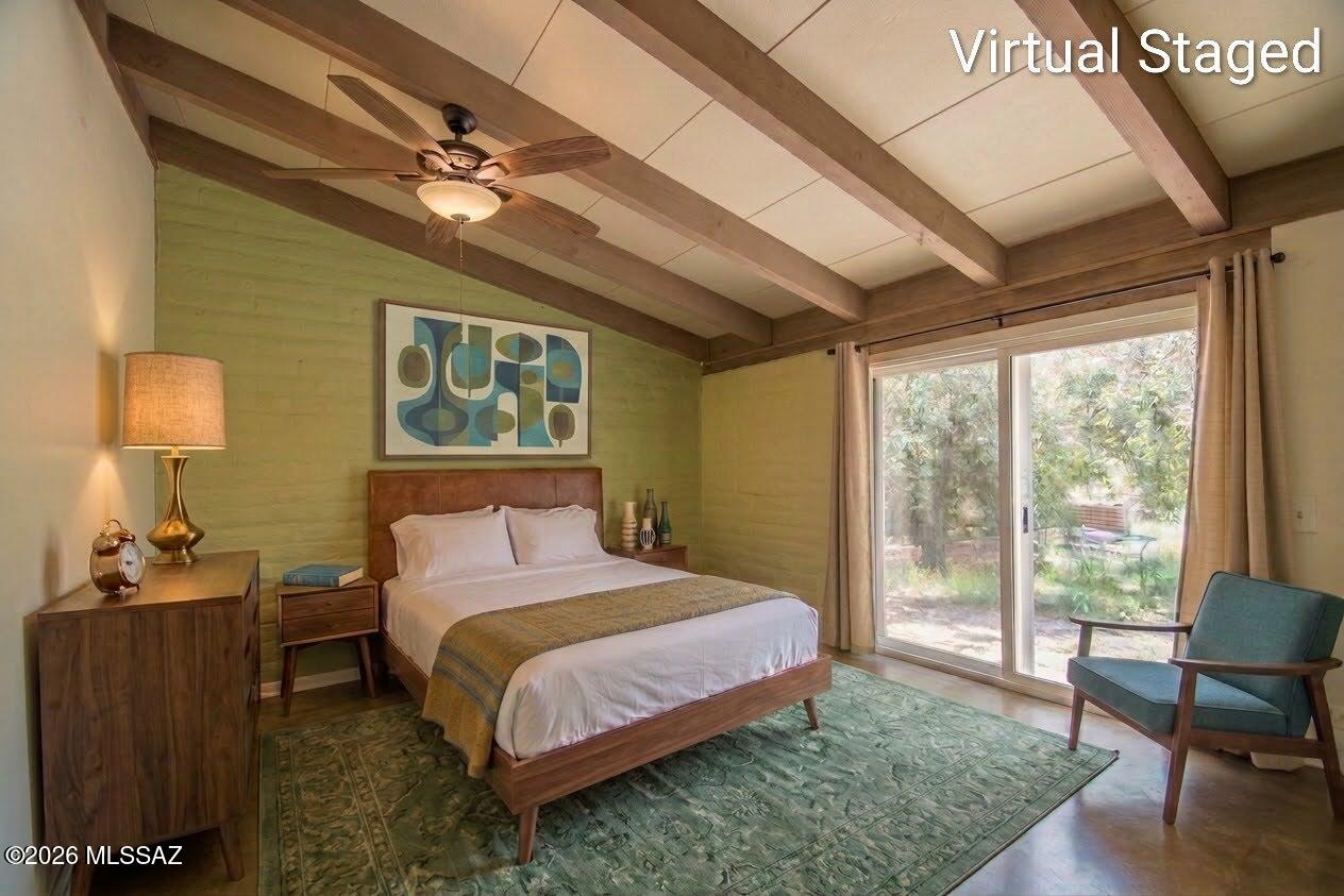 4130 East River Road Tucson, AZ 85718 - Photo 17 of 46 a bedroom with a bed lamps and table