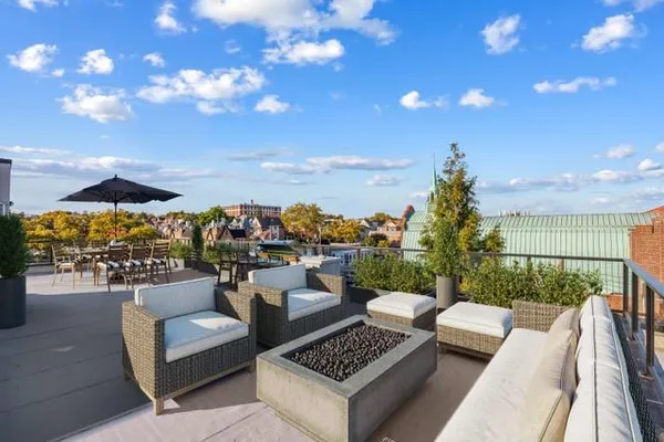 a view of a terrace with couches and a table