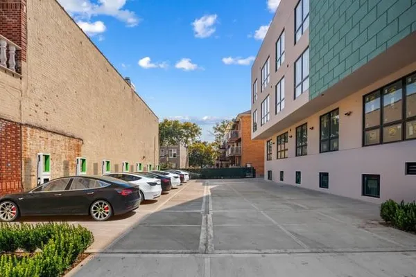 a view of a street with cars