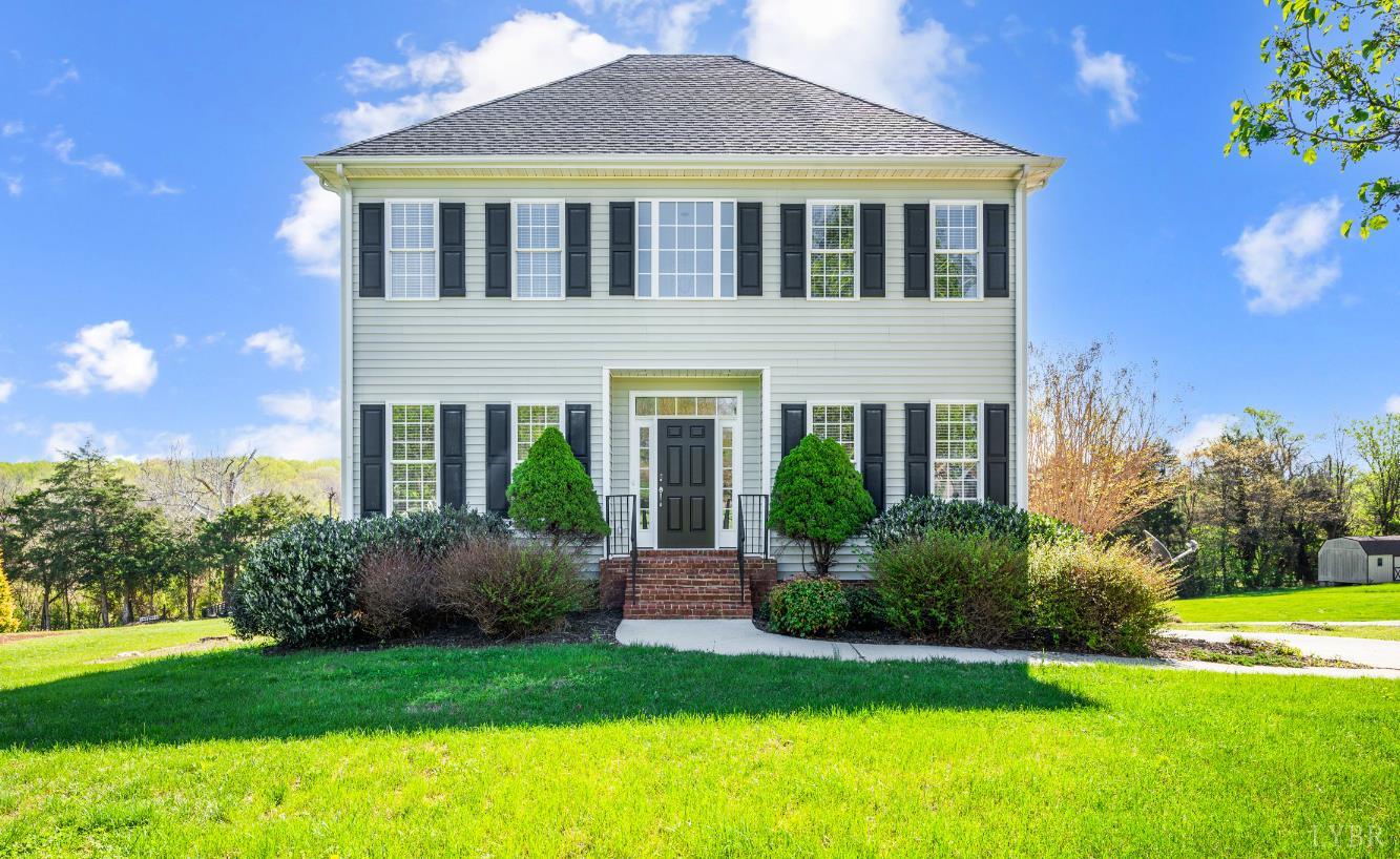 1166 Caperton Way Forest, VA 24551 - Photo 1 of 59 a front view of a house with a yard