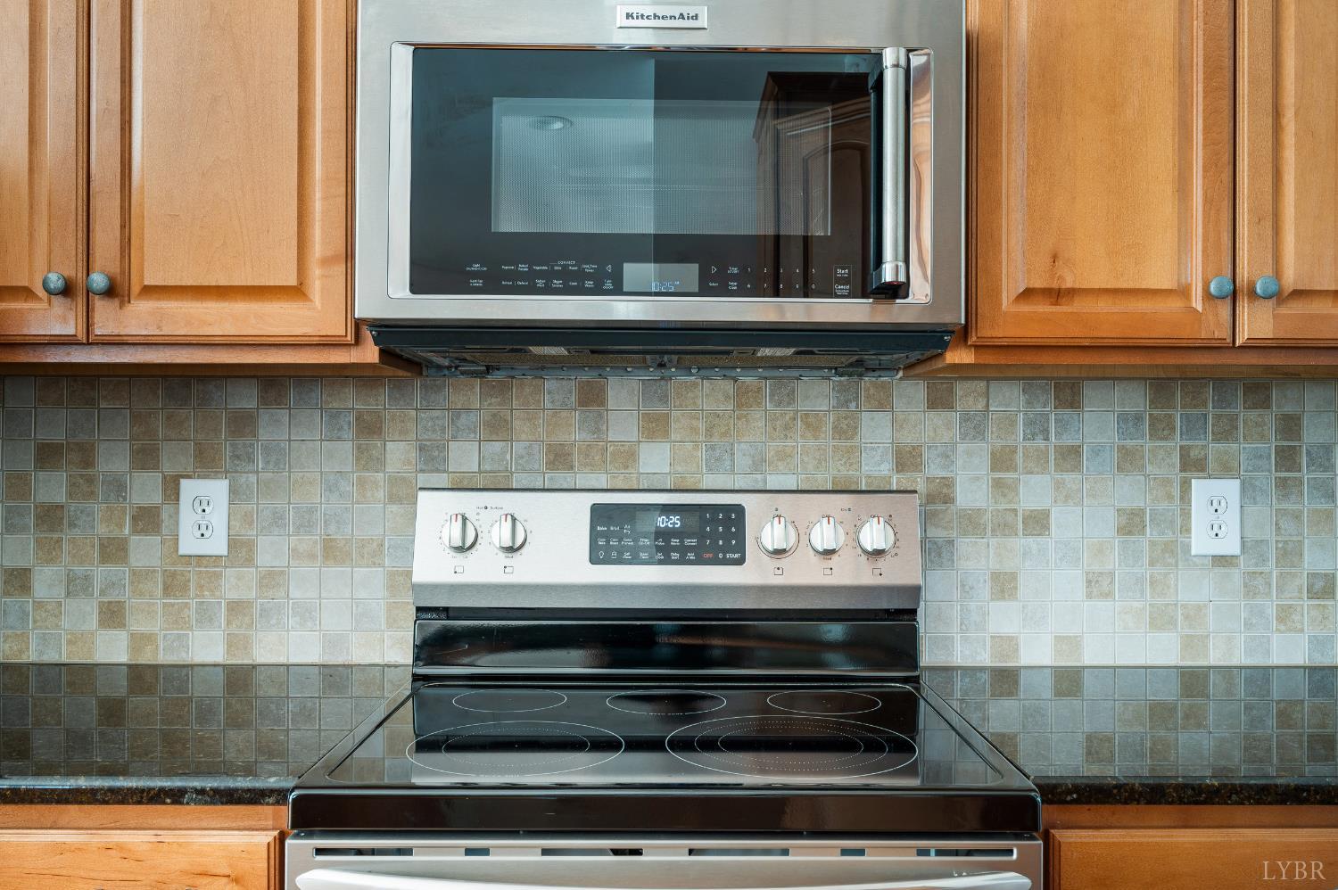 1166 Caperton Way Forest, VA 24551 - Photo 11 of 59 a stove top oven sitting inside of a kitchen