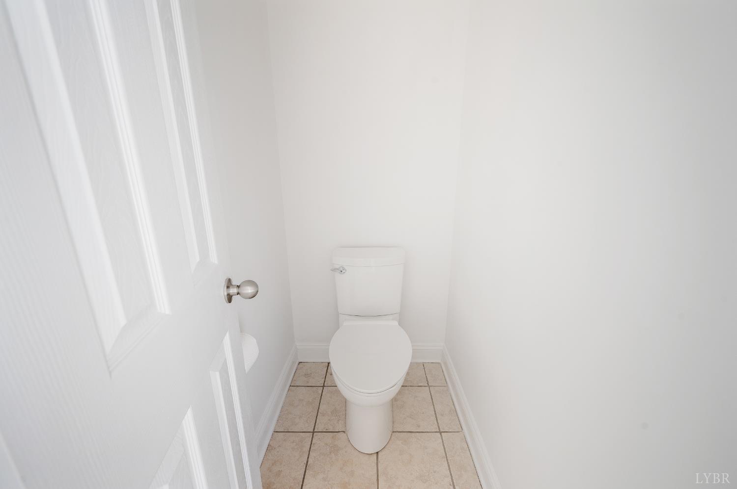 1166 Caperton Way Forest, VA 24551 - Photo 31 of 59 a white toilet sitting next to a white wall