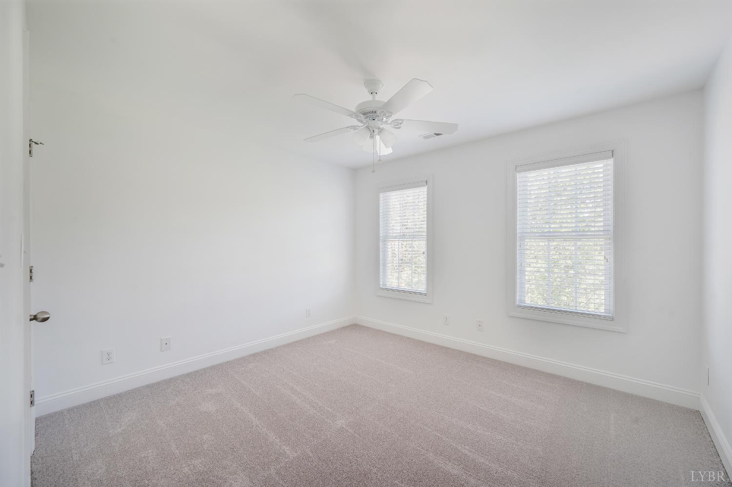 1166 Caperton Way Forest, VA 24551 - Photo 35 of 59 an empty room with a window and a fan