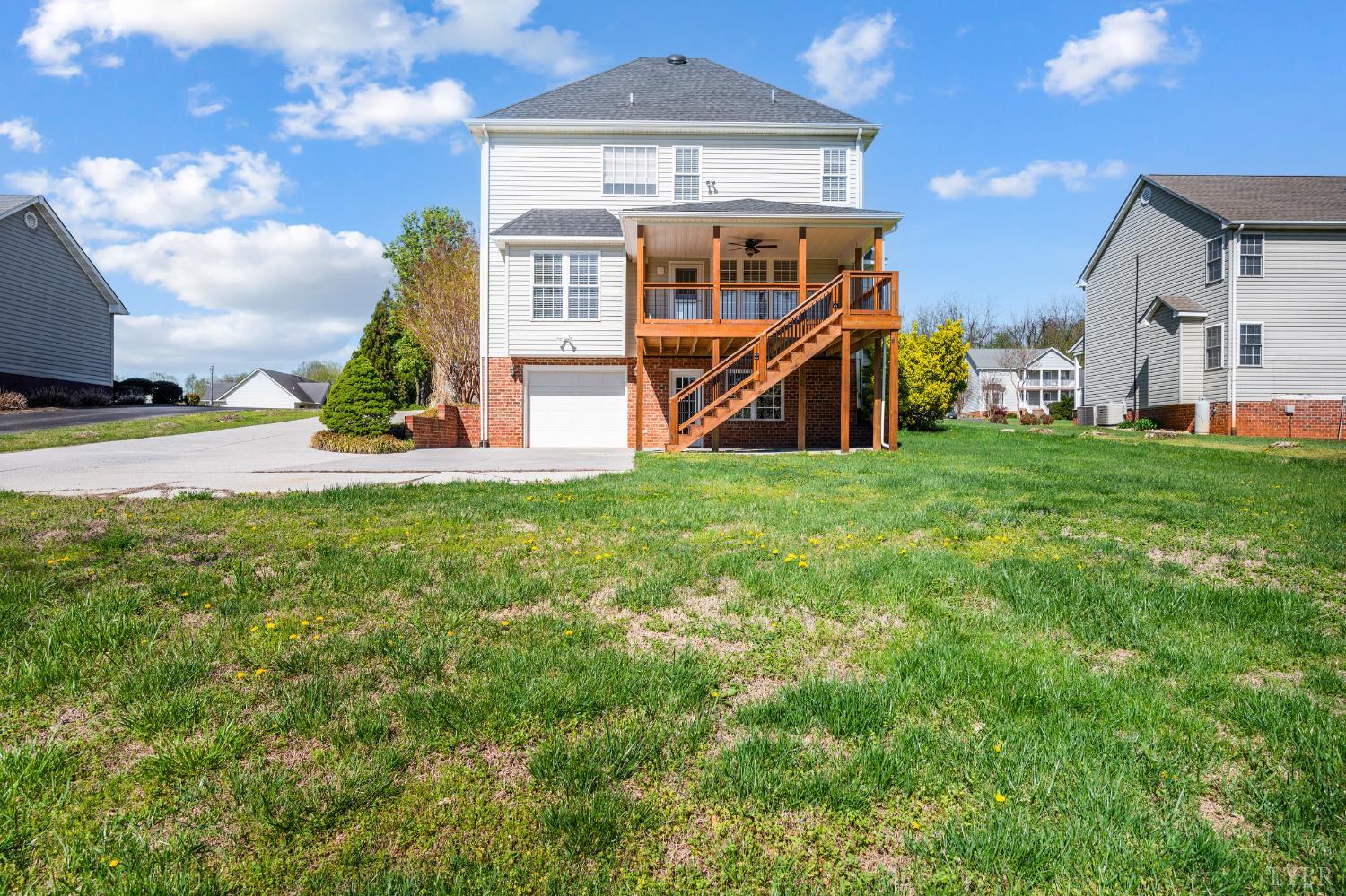 1166 Caperton Way Forest, VA 24551 - Photo 48 of 59 a view of a house with a big yard