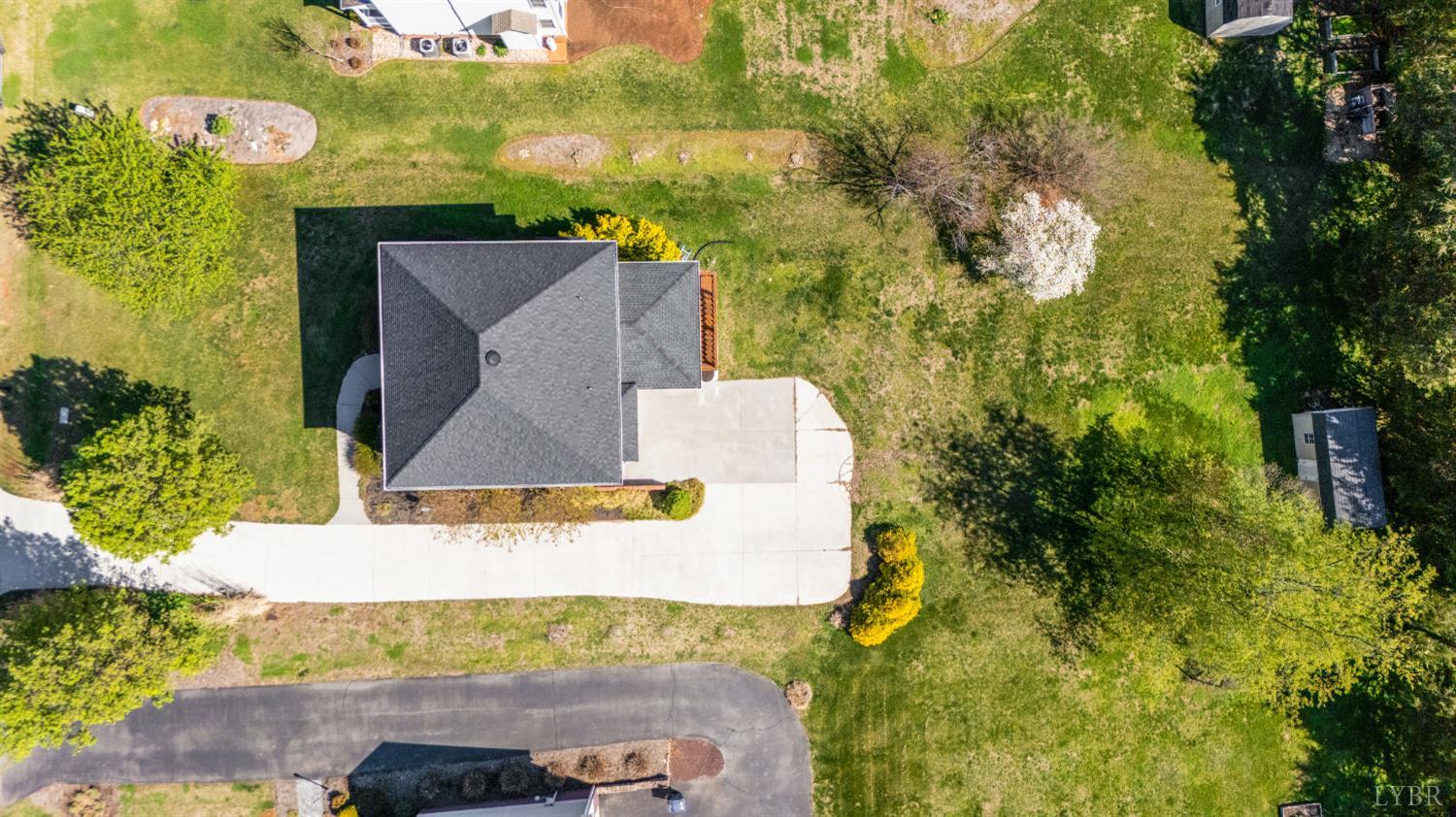 1166 Caperton Way Forest, VA 24551 - Photo 52 of 59 an aerial view of a house with a yard