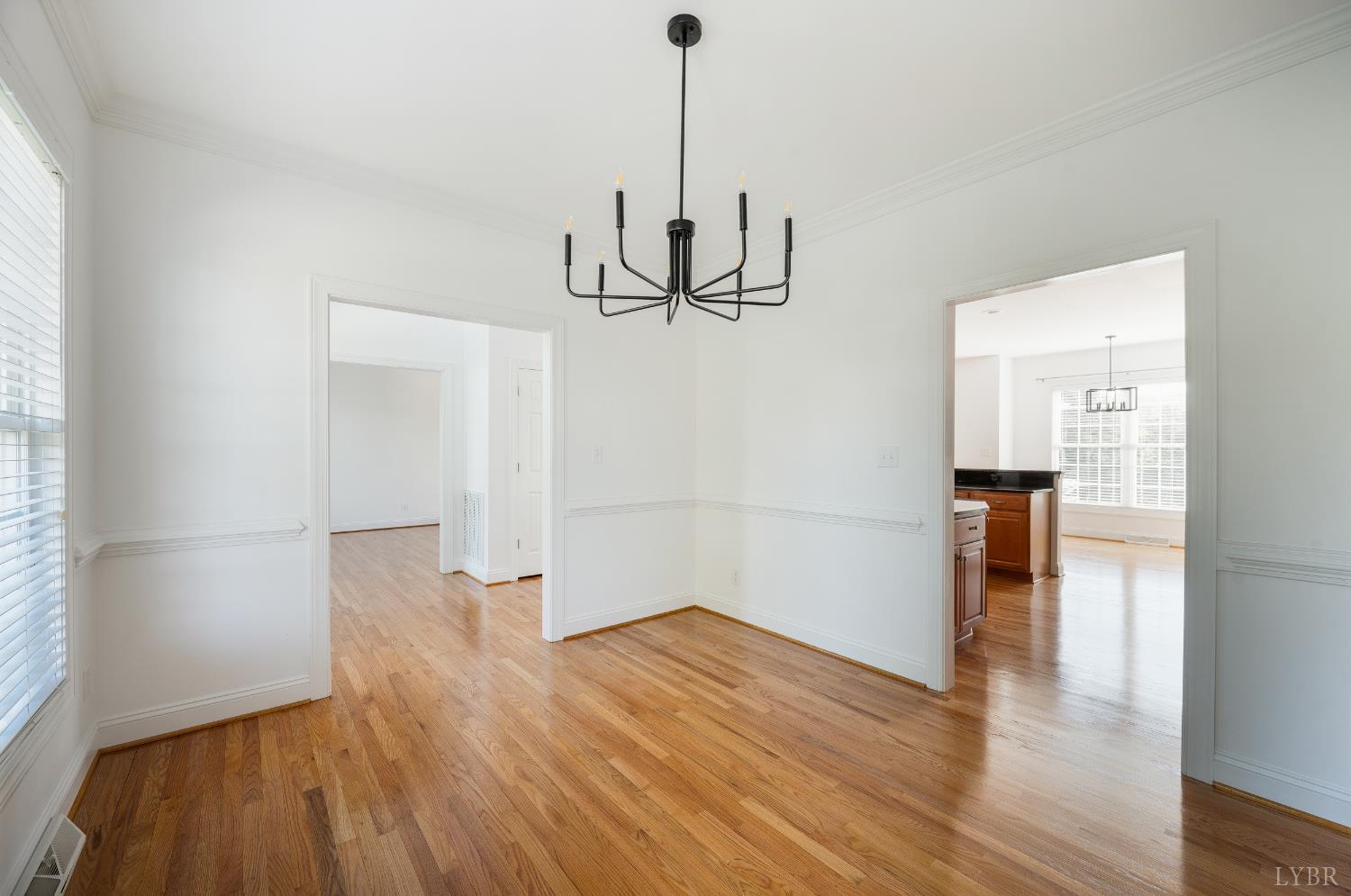 1166 Caperton Way Forest, VA 24551 - Photo 9 of 59 a view of a room with wooden floor and ceiling fan
