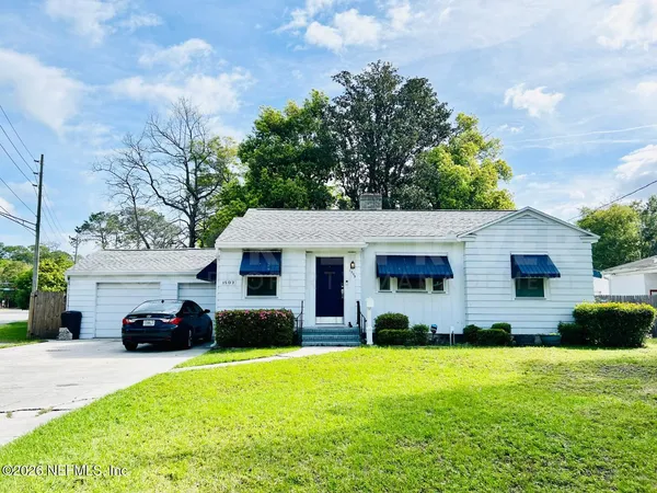 a house view with a garden space