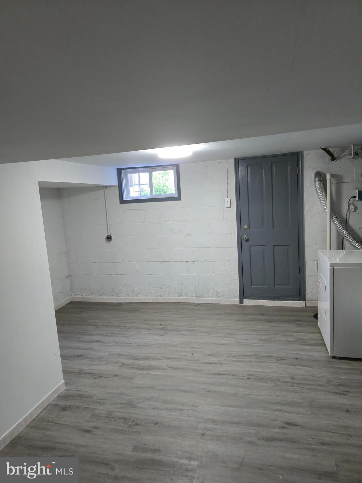 721 Roundview Road Baltimore, MD 21225 - Photo 12 of 30 a view of an empty room and kitchen space