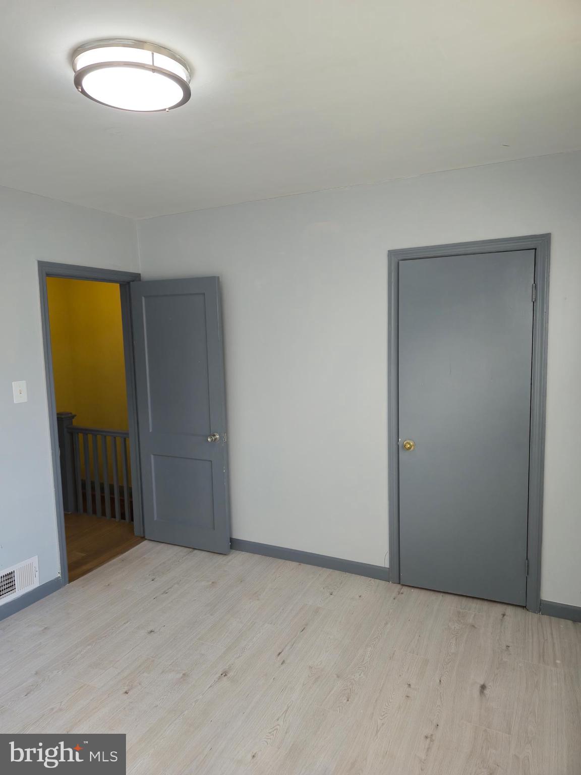 721 Roundview Road Baltimore, MD 21225 - Photo 27 of 30 an empty room with window