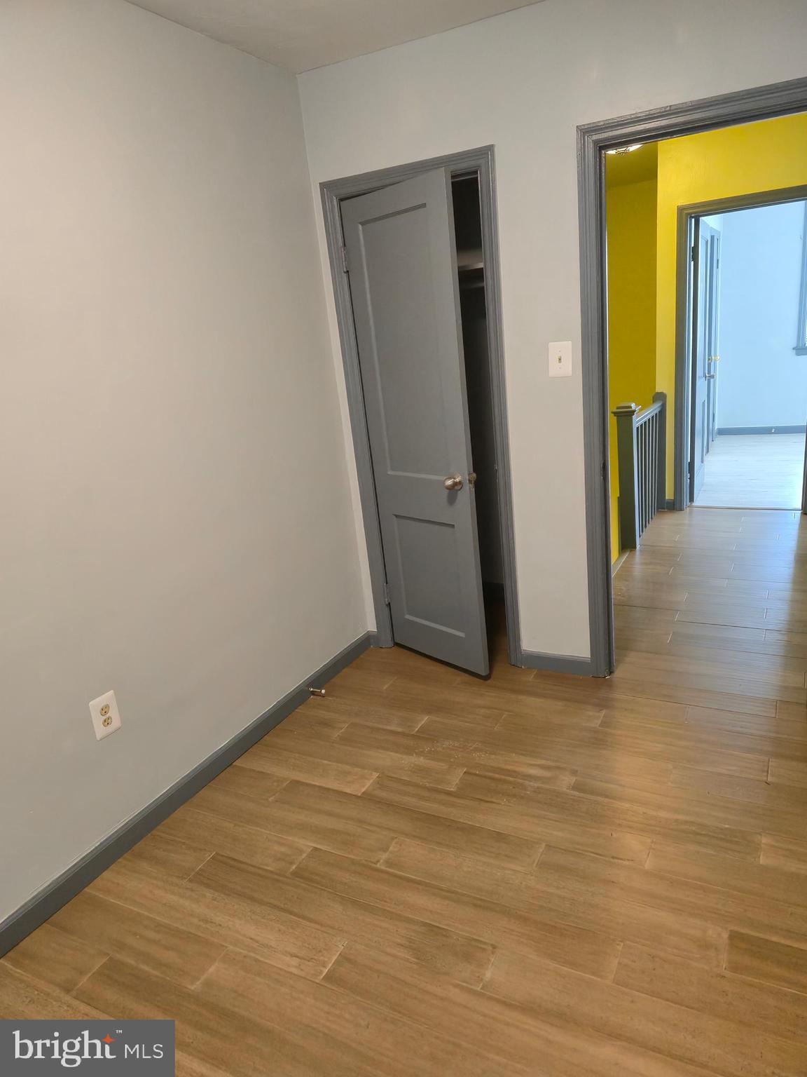 721 Roundview Road Baltimore, MD 21225 - Photo 29 of 30 a view of an empty room with closet and a window