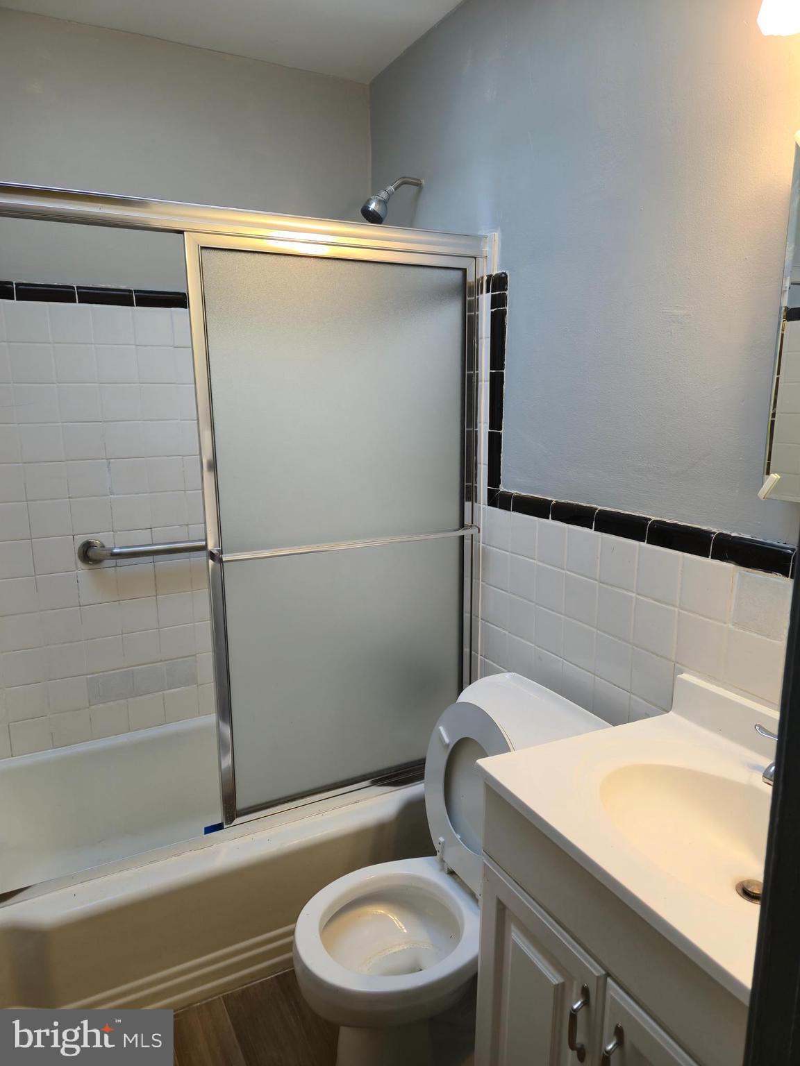 721 Roundview Road Baltimore, MD 21225 - Photo 7 of 30 a bathroom with a toilet and a shower