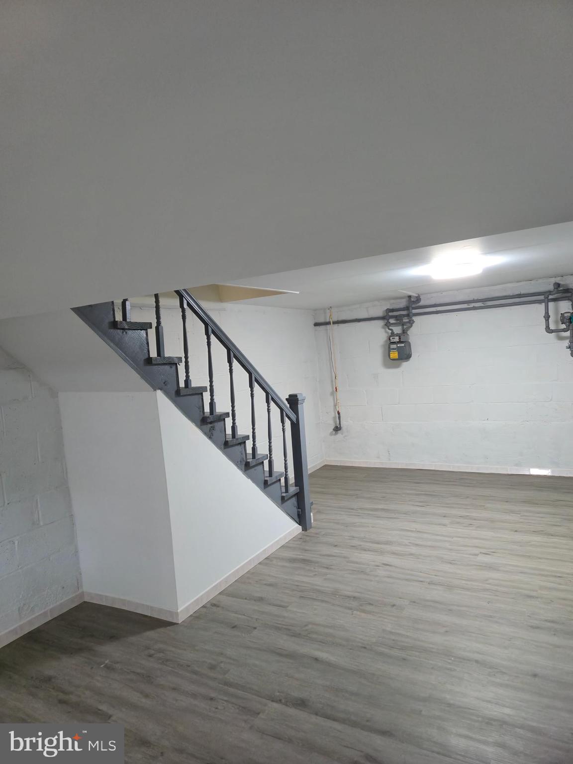 721 Roundview Road Baltimore, MD 21225 - Photo 10 of 30 a view of entryway with wooden floor