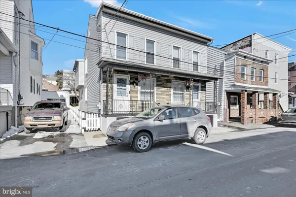 a car parked in front of a building