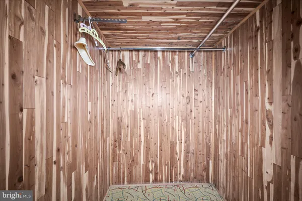 a view of a room with a wooden walls