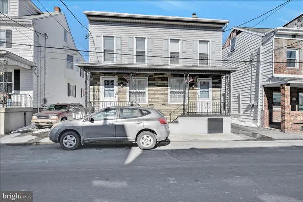 a car parked in front of a building