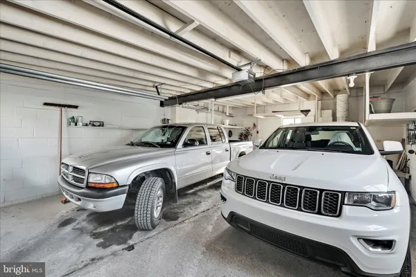 a view of roof deck with furniture