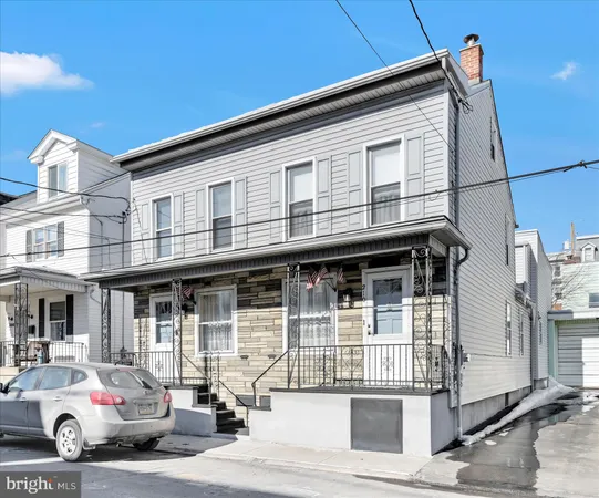 a car parked in front of a building