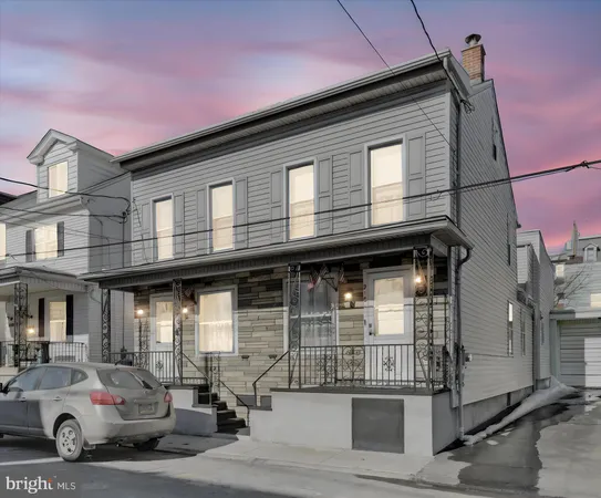 a car parked in front of a building