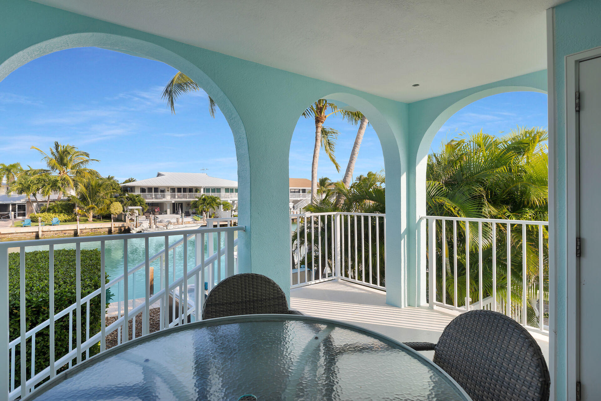 580-590 10th Street Key Colony Beach, FL 33051 - Photo 10 of 75 a view of a balcony with furniture