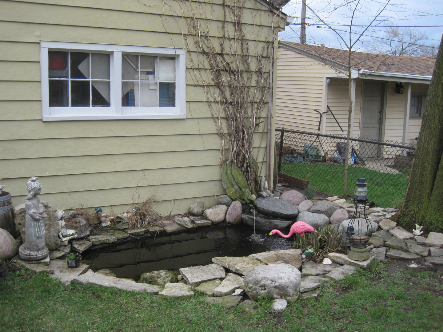 2419 Elm Street River Grove, IL 60171 - Photo 12 of 12 a backyard of a house with lots of green space and outdoor seating