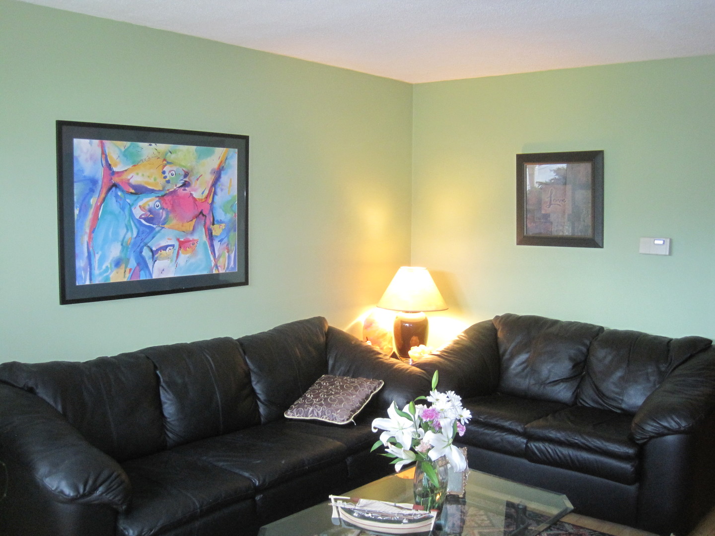 2419 Elm Street River Grove, IL 60171 - Photo 2 of 12 a living room with furniture a couch and a painting on the wall