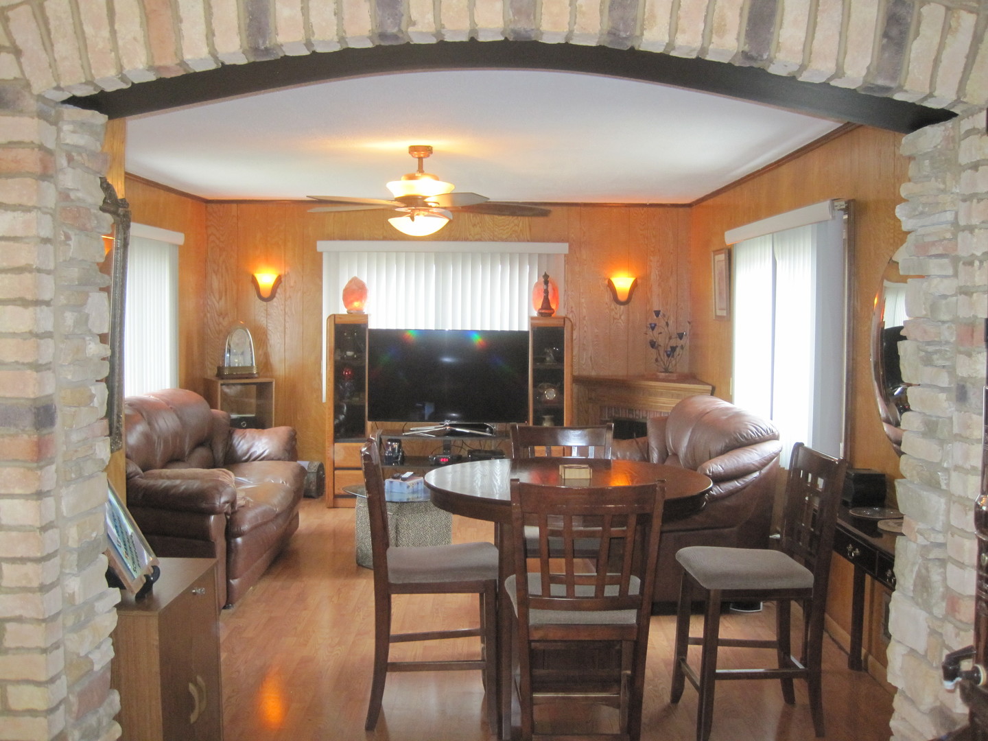 2419 Elm Street River Grove, IL 60171 - Photo 4 of 12 a view of a dining room with furniture and wooden floor