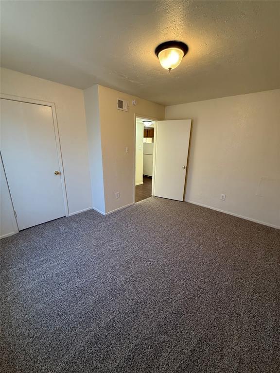 1713 Short Street, Unit A Cleburne, TX 76033 - Photo 5 of 8 a view of empty room