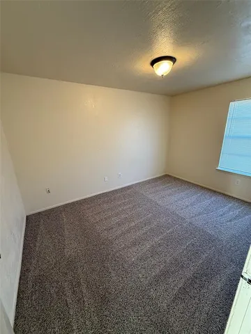 an empty room with a workbench